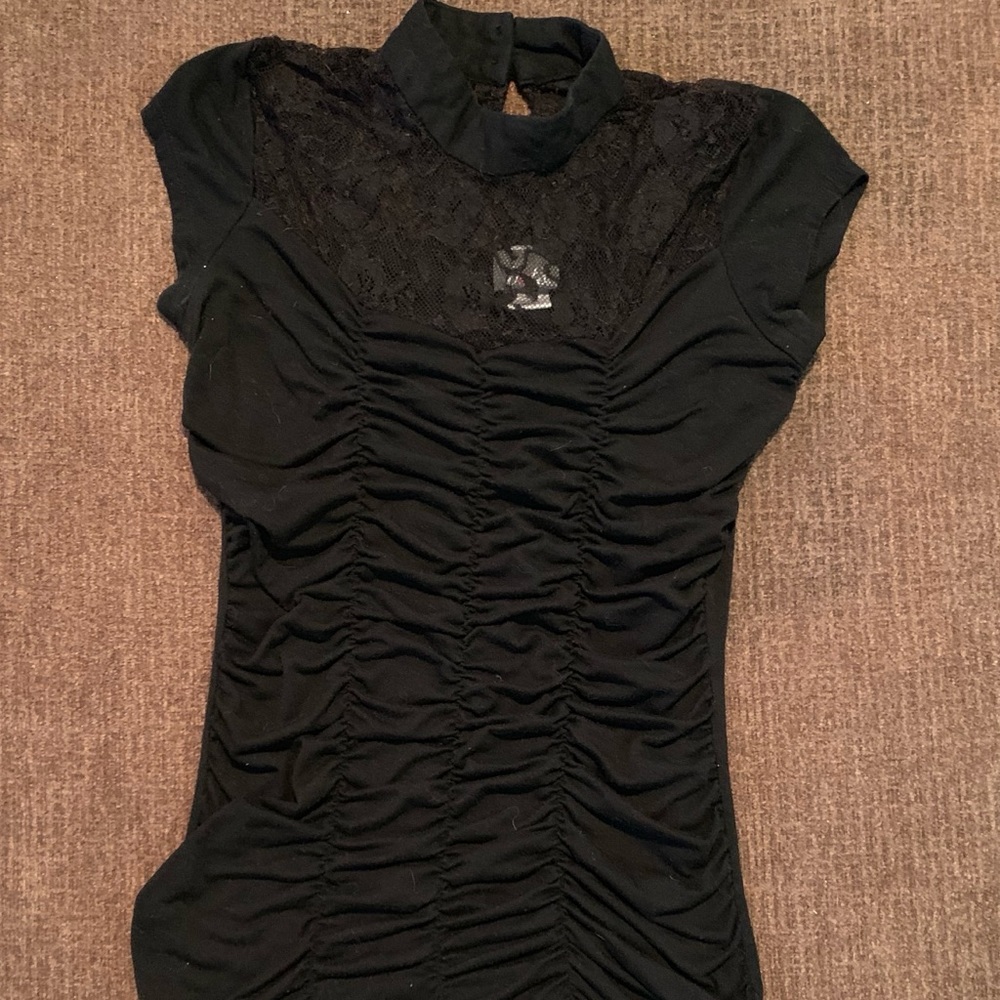 Around the Neck Top With Lace over chest area.